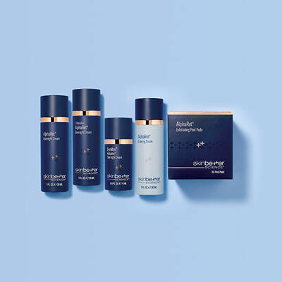 Three skinbetter science products lined up horizontally on a pale grey surface